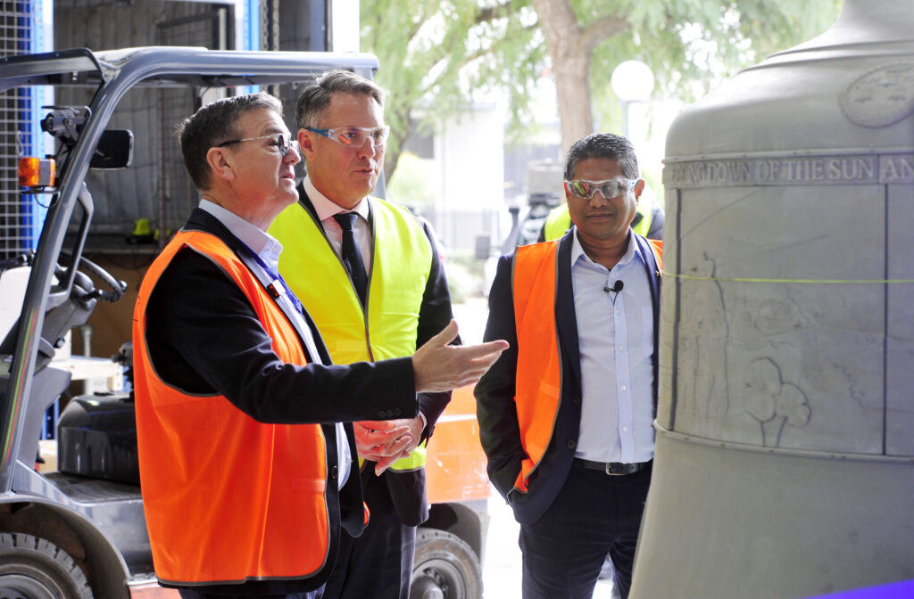 Engineering team at VEEM Ltd showcasing the cast of the ANZAC memorial bell that was manufactured in house, to Hon Richard Marles, Deputy Prime Minister, and Ministers for Defence in Australia.